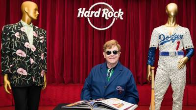 Elton John gets legendary sequined Dodgers uniform back from the Hard Rock Cafe